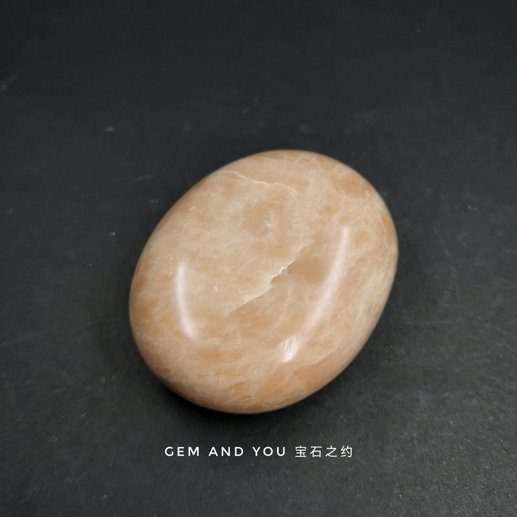 Peach Moon Stone Orange Moon Stone palm stone 58mm*45mm*22mm