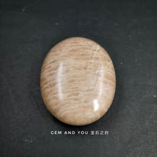 Load image into Gallery viewer, Peach Moon Stone Orange Moon Stone palm stone 60mm*47mm*20mm